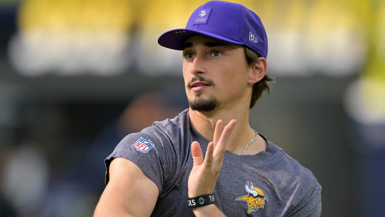 Max Brosmer warms up before facing the Chargers at SoFi Stadium.