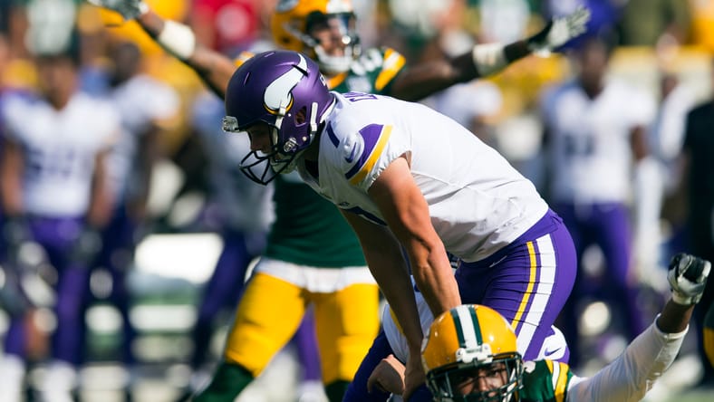 Vikings kicker Daniel Carlson reacts after missing a game-winning field goal against the Packers at Lambeau Field.