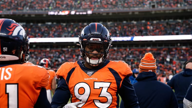 Denver Broncos defensive end Dre’Mont Jones prepares for a play against the Raiders at Empower Field at Mile High.
