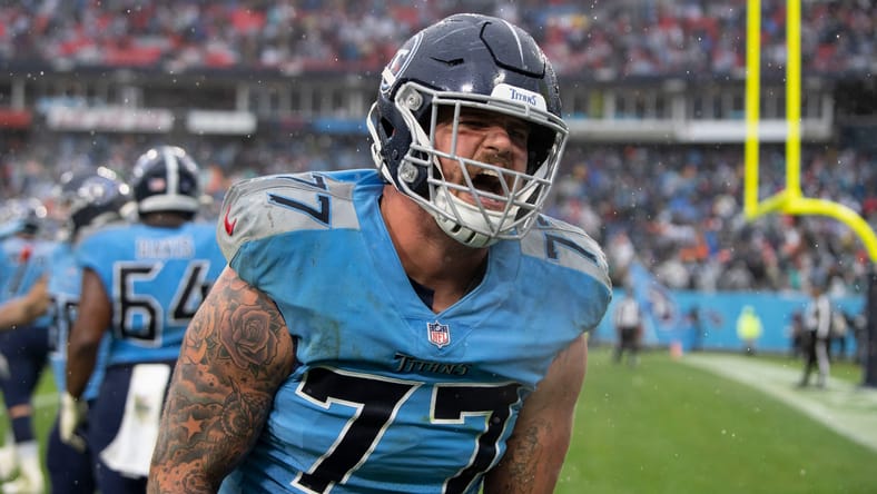 Taylor Lewan celebrates after the Titans’ win over Miami.