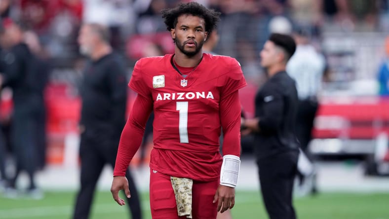 Kyler Murray warms up before facing the Falcons.