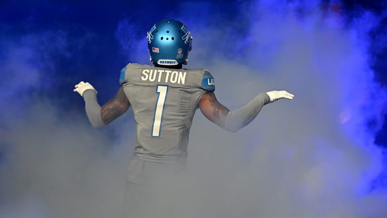 Cameron Sutton runs onto the field during introductions, arms outstretched, before the Lions’ home game versus the Vikings.