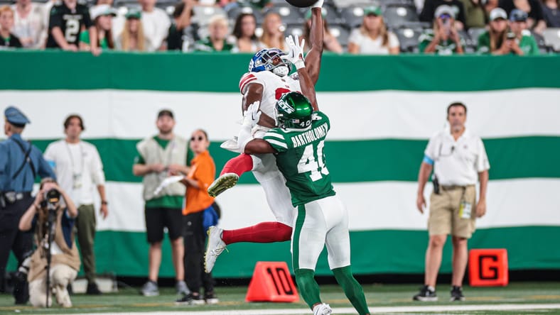 Shemar Bartholomew breaks up a pass while covering Miles Boykin during the Jets-Giants preseason matchup.