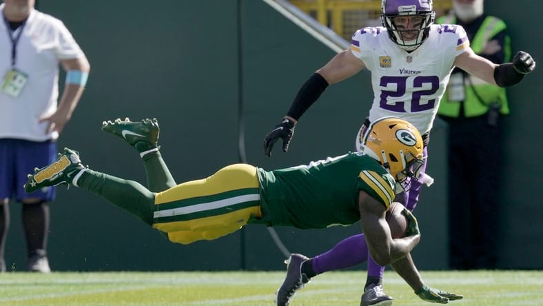 Packers RB Josh Jacobs in 2024 vs. Vikings safety Harrison Smith