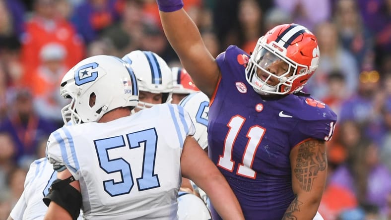 Peter Woods reacts after a sack for Clemson