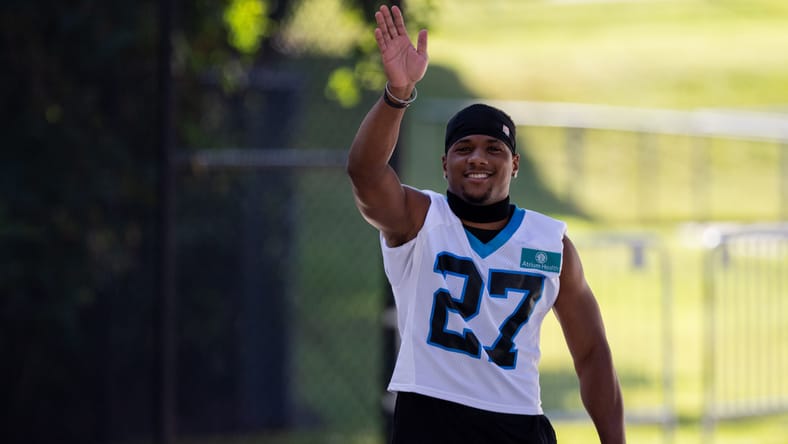 New Vikings CB Shemar Bartholomew waves to the media while heading to the field during Panthers training camp in Charlotte.