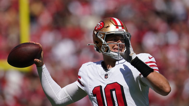 Mac Jones fires a pass downfield against the Cardinals at Levi’s Stadium. Jones could be a Vikings trade option in 2026. 
