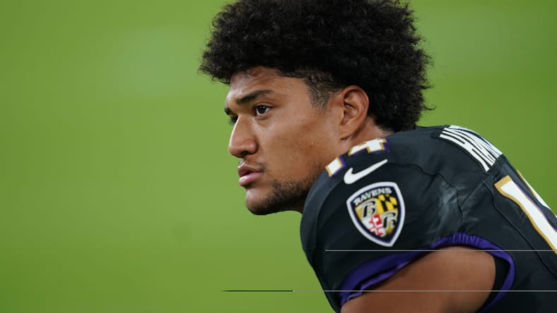 Kyle Hamilton warms up before the Ravens’ game vs. the Lions.