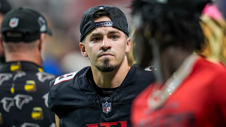 Parker Romo stands ready on the field during the Falcons’ home game versus the Commanders.
