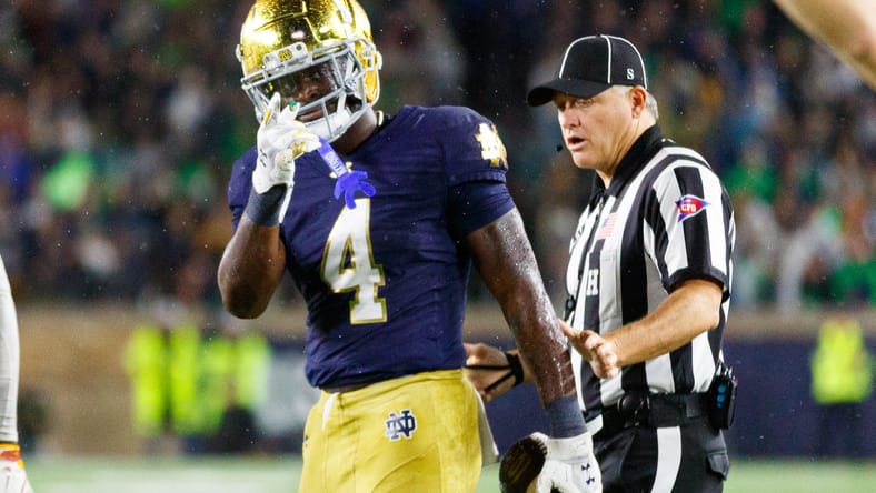 Jeremiyah Love celebrates a first down against USC at Notre Dame Stadium.