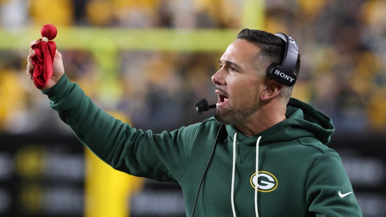 Packers head coach Matt LaFleur challenges a call late in the fourth quarter against the Steelers at Acrisure Stadium on October 26, 2025.