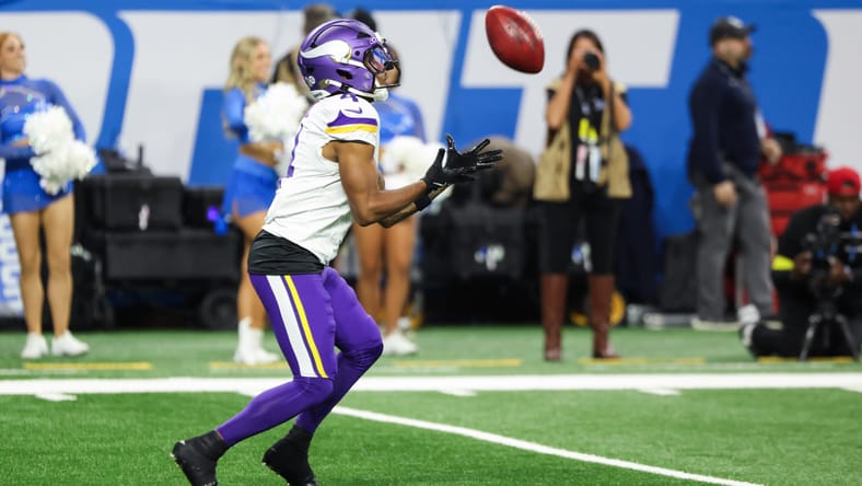 Myles Price returns a first-quarter kickoff against the Lions during the Vikings’ divisional game at Ford Field.