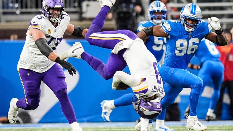 Vikings QB J.J. McCarthy does a somersault in Detroit.