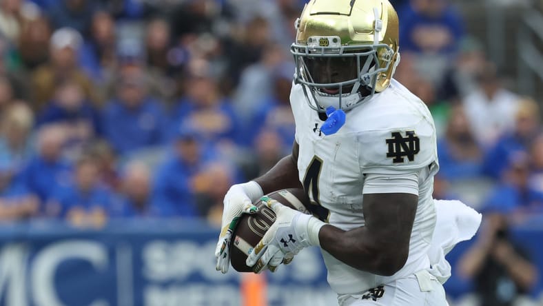 Jeremiyah Love runs after a catch versus Pitt at Acrisure Stadium. Love could join the Vikings in 2026 via the draft. 