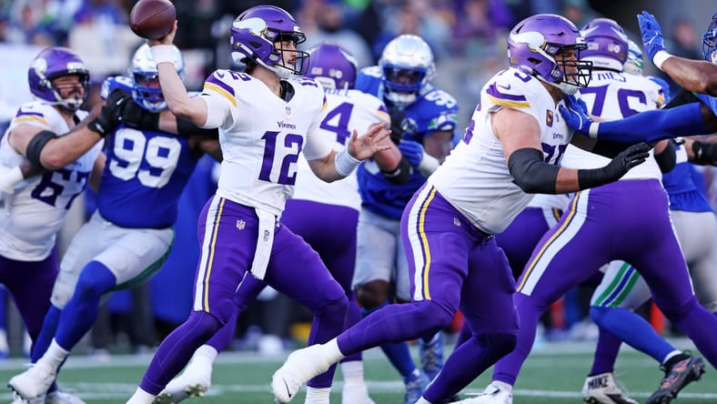 Max Brosmer drops back to pass in the second half at Lumen Field.