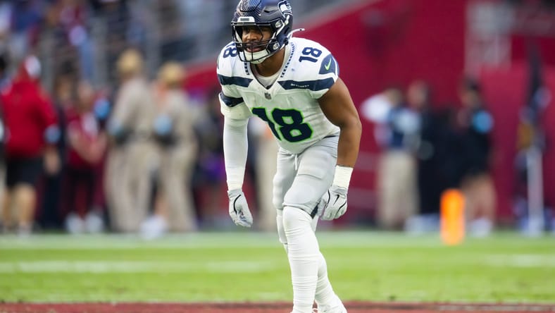 Josh Ross defends against Arizona at State Farm Stadium.