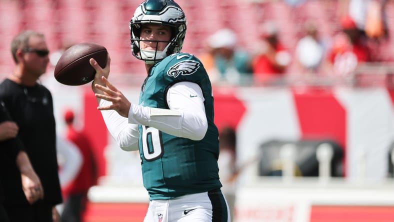 Tanner McKee warms up before Eagles–Buccaneers at Raymond James Stadium.