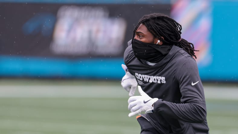 Trevon Diggs warms up before a Cowboys game in Charlotte.