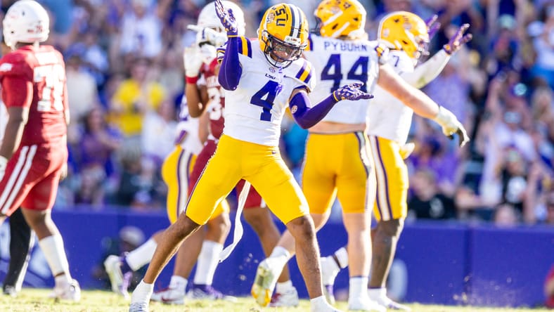 Mansoor Delane celebrates a fourth-down stop for LSU against Arkansas.