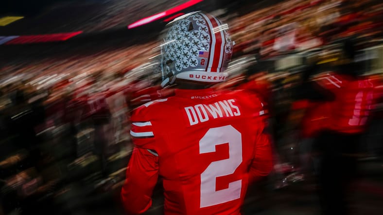 Caleb Downs takes the field for warmups before playing UCLA.