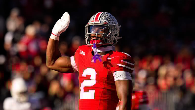 Ohio State defensive back Caleb Downs celebrates after recording a sack against Rutgers at Ohio Stadium.
