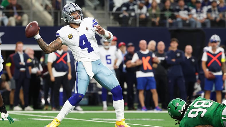 Dak Prescott winds up to throw during first-quarter action at AT&T Stadium.