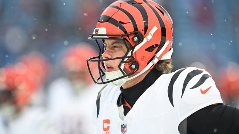 Joe Burrow looks on before the Bengals face the Bills. Vikings fans will want Burrow if he seeks a trade in 2026.