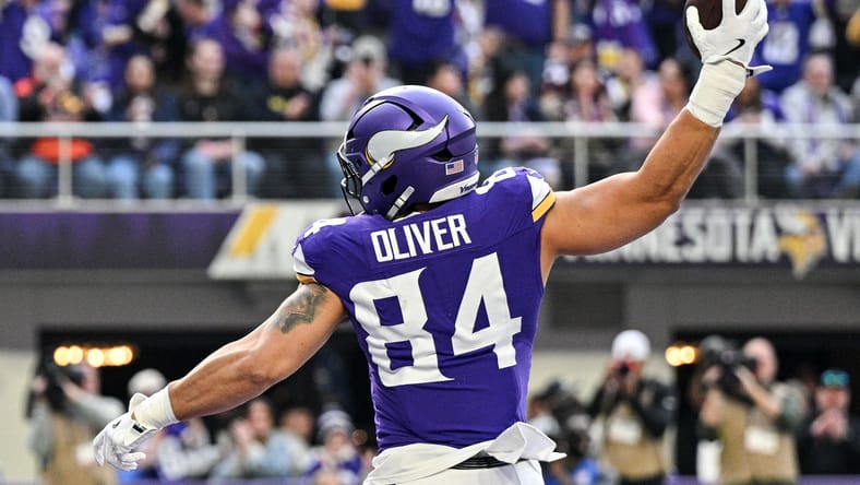 Josh Oliver reacts after a touchdown versus Washington.