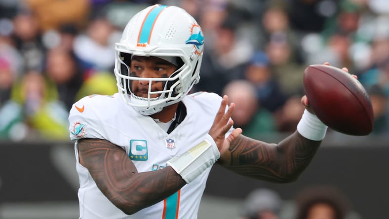 Tua Tagovailoa passes against the Jets during the first half at MetLife Stadium. Vikings Tua Tagovailoa rumors.