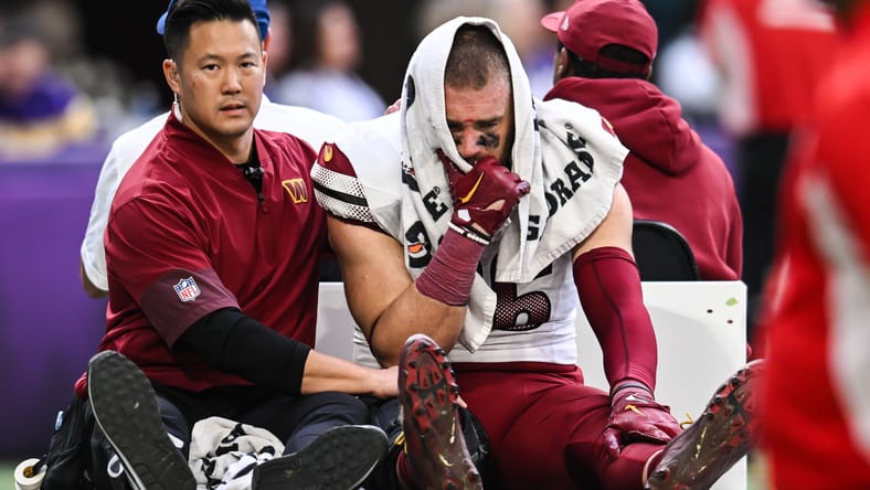 Zach Ertz is carted off after being injured in Minneapolis.