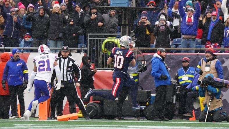 Drake Maye runs for a touchdown against the Buffalo Bills at Gillette Stadium.