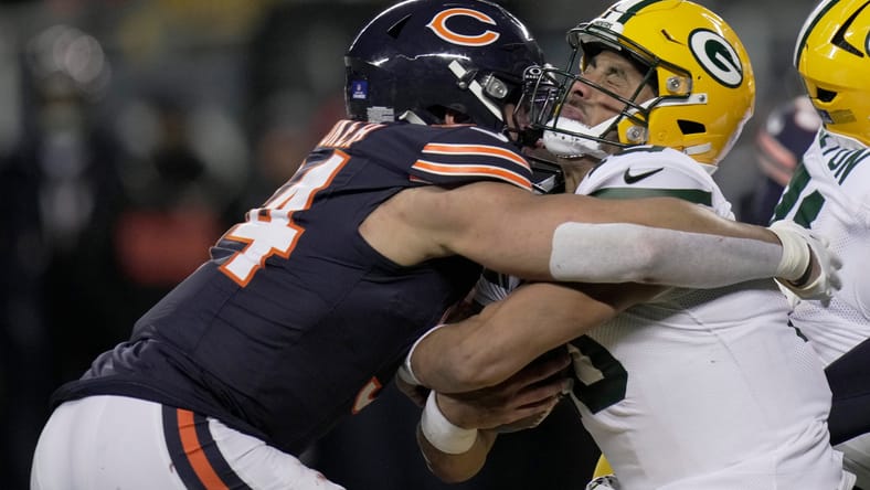 Bears defensive end Austin Booker sacks Packers quarterback Jordan Love at Soldier Field