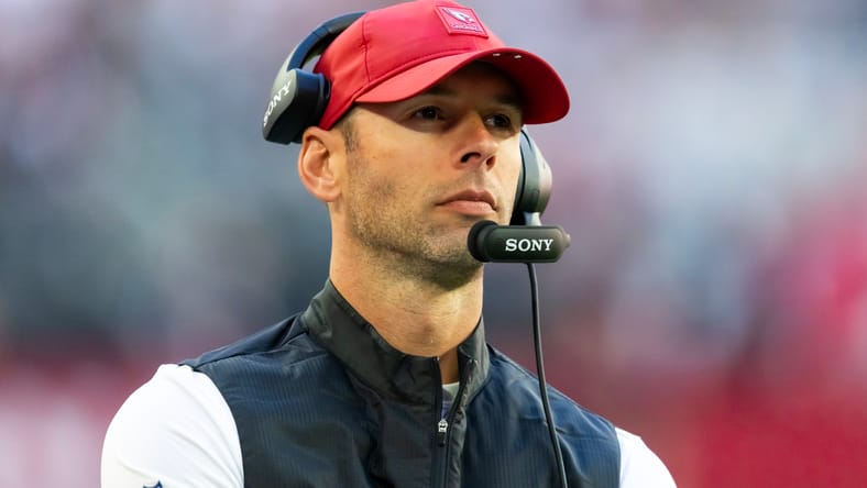 Jonathan Gannon watches action from the sideline during a Cardinals game.