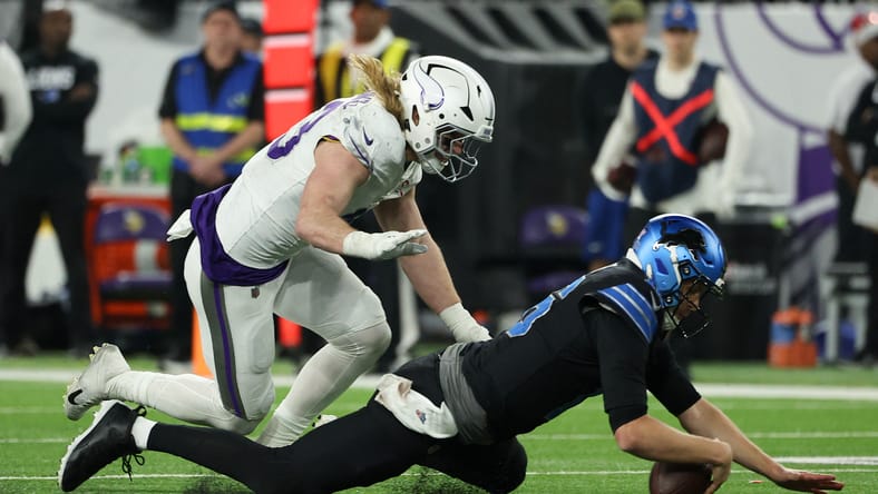 Andrew van Ginkel pressures Jared Goff as the quarterback attempts to recover a fumble.