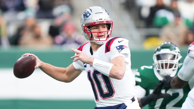 Patriots quarterback Drake Maye throws a pass against the Jets at MetLife Stadium. Drake Maye MVP race.