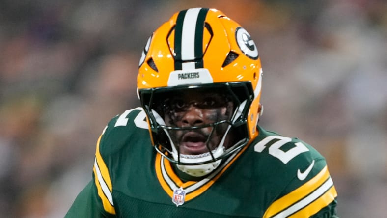 Malik Willis running with the football during a game at Lambeau Field. Vikings rumors 2026 offseason.