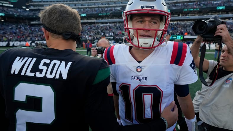 Mac Jones and Zach Wilson after a Patriots win