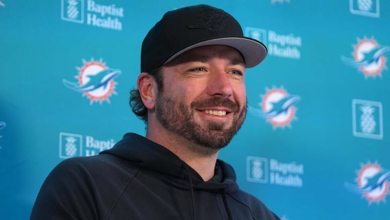 Miami Dolphins offensive coordinator Frank Smith speaking at a press conference in Frankfurt.