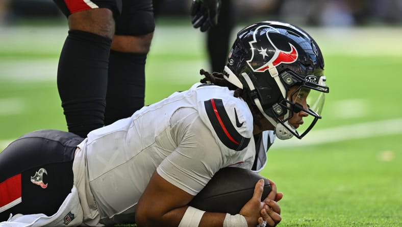 C.J. Stroud in game action against the Vikings in Minneapolis.