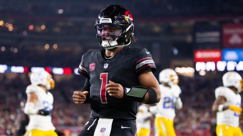 Kyler Murray celebrating a rushing touchdown at State Farm Stadium. Kyler Murray trade value.