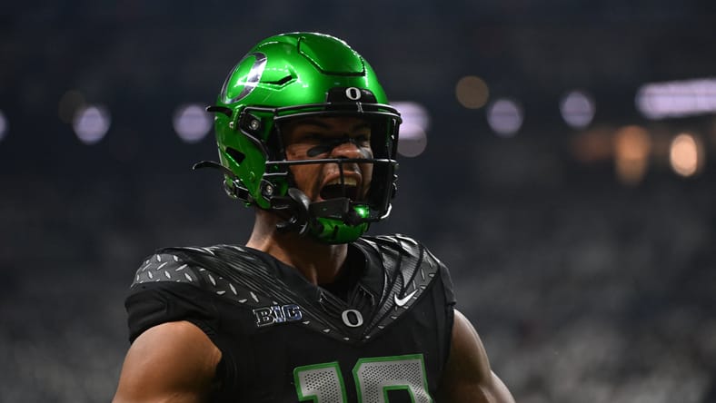 Kenyon Sadiq reacts after a first-quarter touchdown at Lucas Oil Stadium. Vikings mock draft Kenyon Sadiq