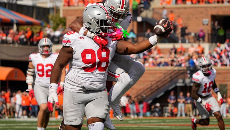 Kayden McDonald celebrating a fumble recovery for Ohio State.