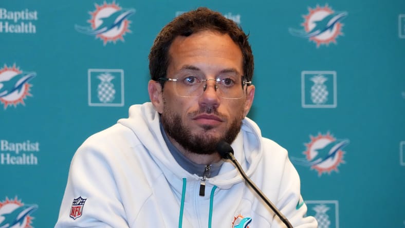 Mike McDaniel speaking at a Dolphins press conference in Madrid. Vikings offensive coordinator search.