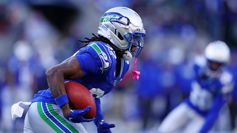 Rashid Shaheed running the ball for Seattle at Lumen Field. Vikings Rashid Shaheed landing spot.