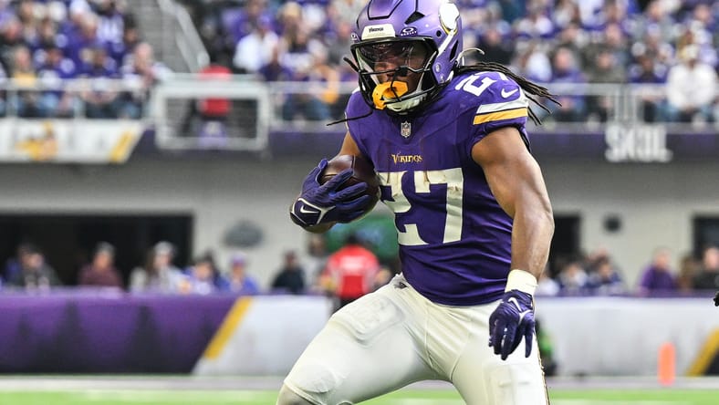 Jordan Mason runs the ball against Washington at U.S. Bank Stadium. Jordan Mason breakout candidate