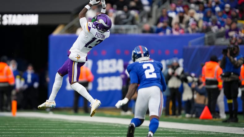 Tai Felton catches a pass while defended by Deonte Banks at MetLife Stadium.