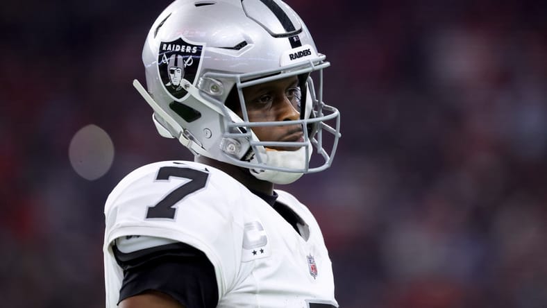 Geno Smith looks toward the sideline during a Raiders game