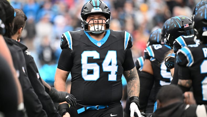Carolina Panthers center Cade Mays runs onto the field before a game at Bank of America Stadium.. Vikings free agency predictions