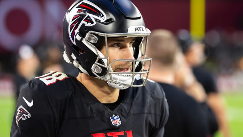 Kirk Cousins plays quarterback for the Falcons against the Cardinals in Arizona.