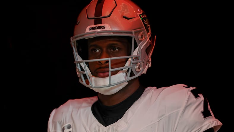 Geno Smith waits in the tunnel before a game
